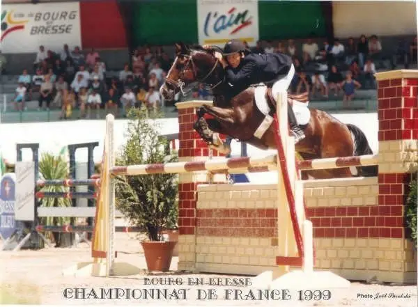 Florent Bonadei during a showjumping competition with his horse, Valkyri, In 1999